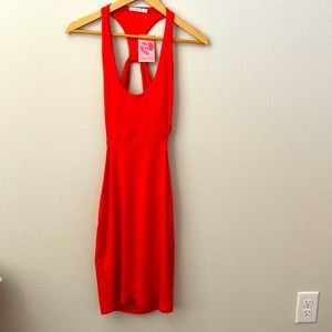 Bright orange open back dress